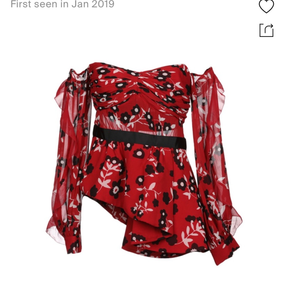 It is a beautiful sexi red top.